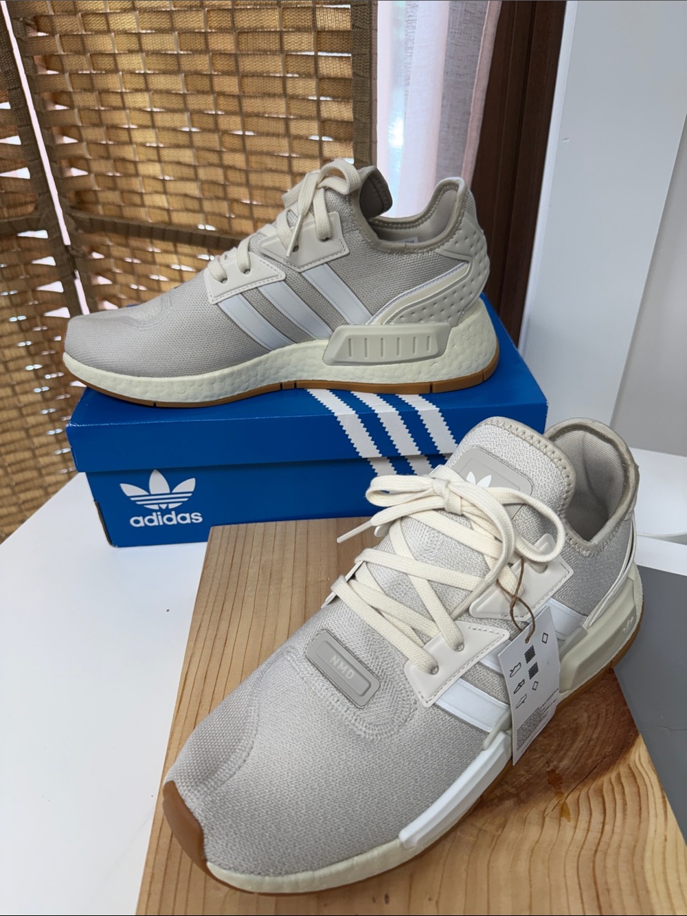 Adidas NMD_G1 sneakers in a white colorway